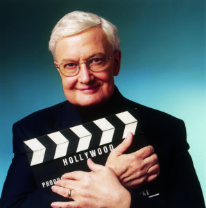 Roger Ebert Holding a Clapperboard